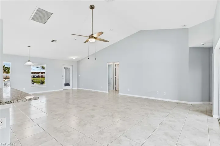 Every detail of this open-concept living space was designed to maximize comfort, connection, and natural light.