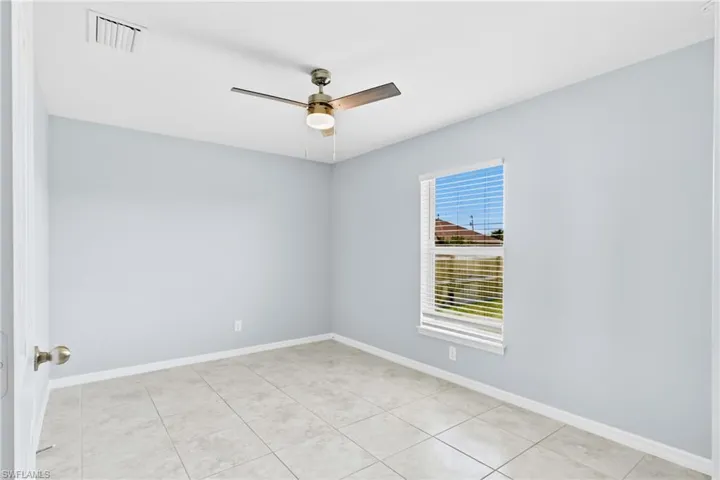 Create the perfect guest retreat in this comfortable bedroom designed with relaxation in mind.