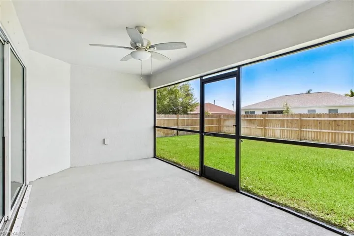 Step outside to the covered lanai, the perfect place to relax with your morning coffee or unwind after a long day.