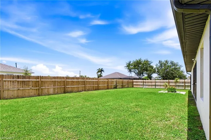 Desirable southern rear exposure provides abundant Florida sunshine, making this backyard ideal for outdoor living and future pool enjoyment.