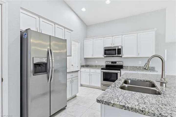Create your favorite meals and lasting memories in this bright and inviting kitchen designed for gathering.