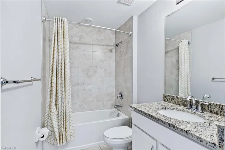 The guest bathroom is beautifully maintained and conveniently located to serve family and visitors alike.