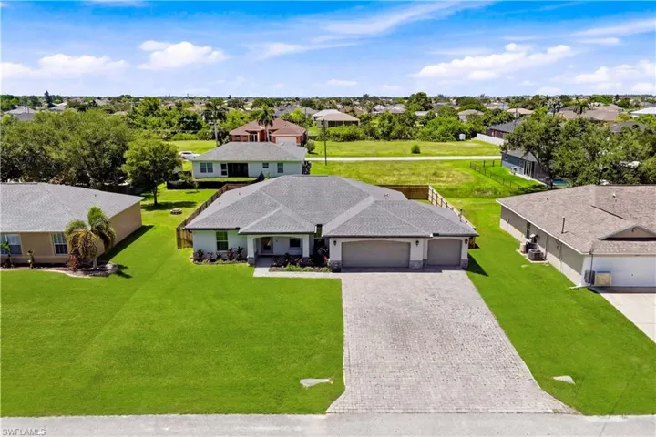 An aerial perspective highlights the home's attractive setting within one of Northwest Cape Coral's rapidly growing neighborhoods.