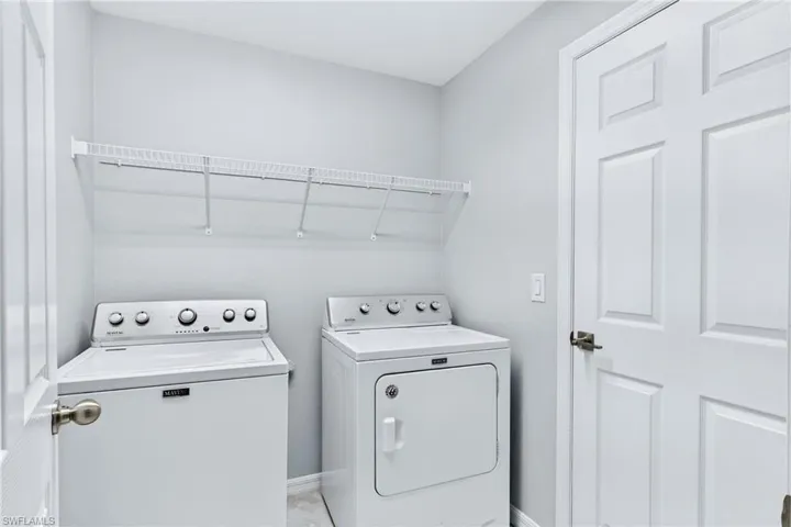 A dedicated indoor laundry room adds convenience and functionality to everyday living.