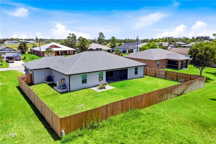 Step outside to a spacious fenced yard designed for comfort, privacy, and enjoying sunny Southwest Florida days