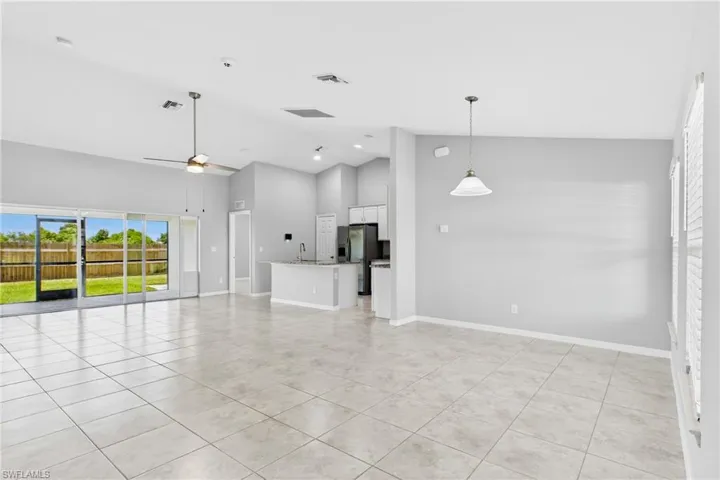 The dining area flows effortlessly from the kitchen and living room, making every meal feel connected and inviting.
