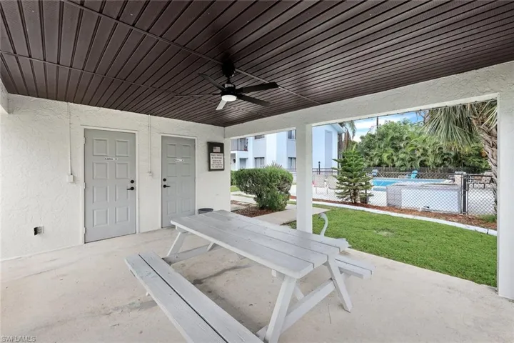 View of patio featuring a ceiling fan