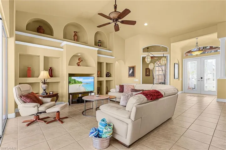 Living room with flatscreen tv and seating