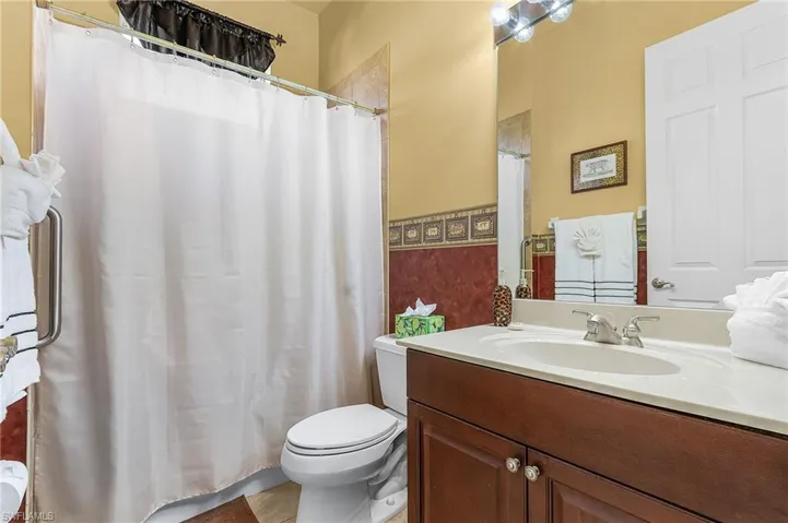 Guest Bathroom featuring tub/shower combo