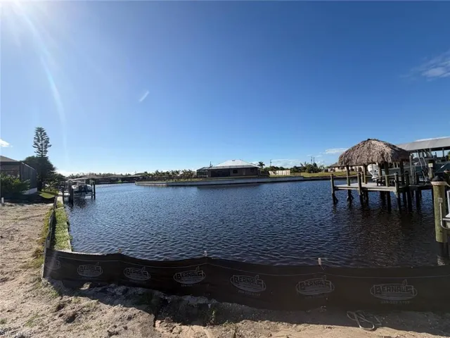 Dock featuring a water view and boat lift