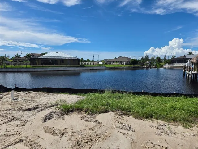 Water view with nearby suburban area