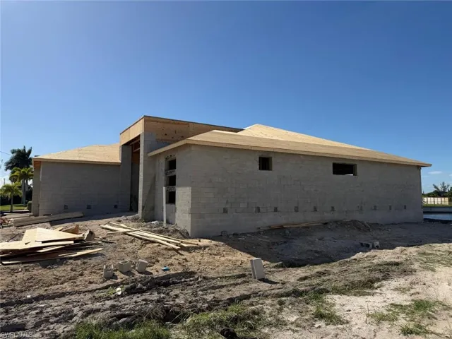 View of home's exterior with concrete block siding