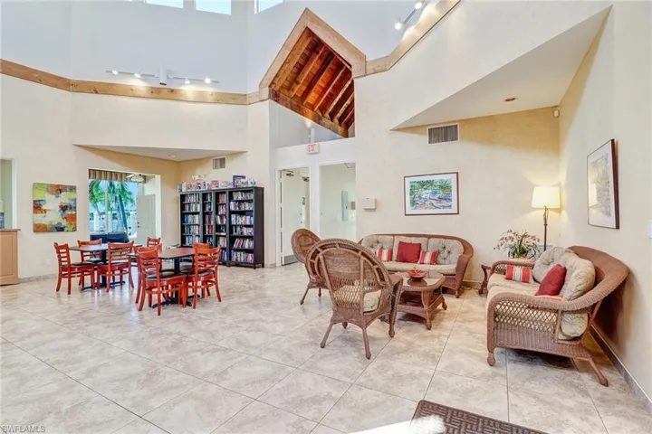 Living room featuring a towering ceiling