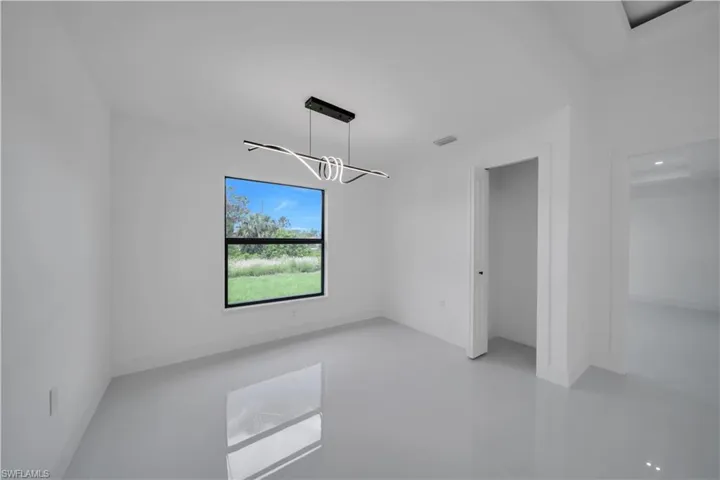 Empty room with a chandelier