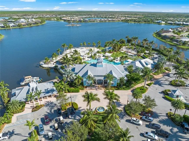 Naples Reserve is a manned gated community. The Island Club offers a cafe, meeting spaces, resort style pool, lap swimming lanes, bocce ball court and private beach on the 125 acre Big Eagle Lake with private beach offering volleyball and sunbathing. The low HOA fees include all the clubhouse amenities, lawn care and irrigation for each home.