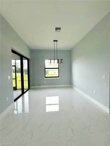 View of tiled spare room