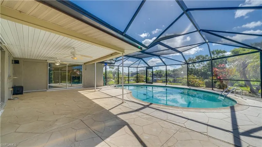 View of swimming pool with a patio