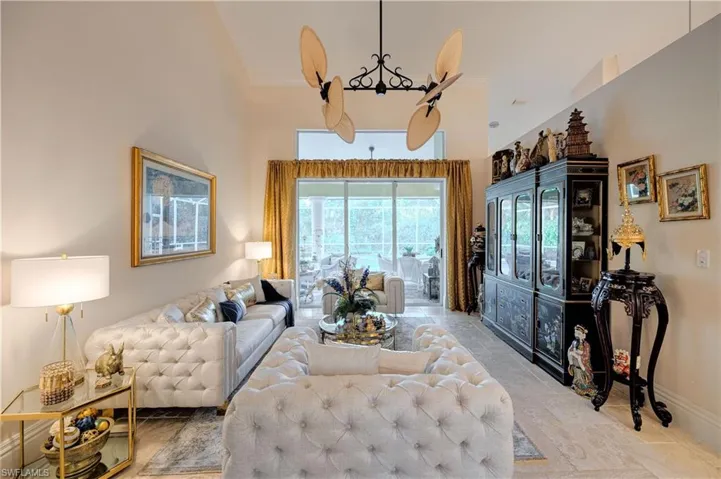 Living room featuring a towering ceiling