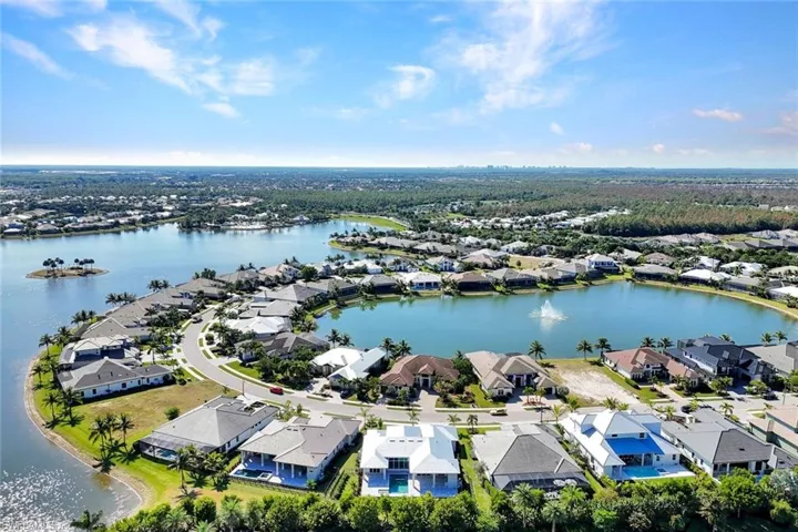Aerial view of residential area with a nearby body of water