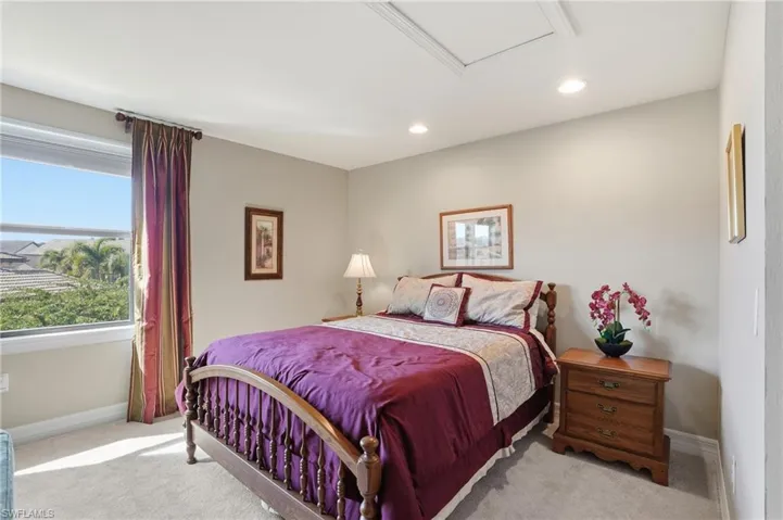 Second story Bedroom open loft area featuring carpet flooring and recessed lighting