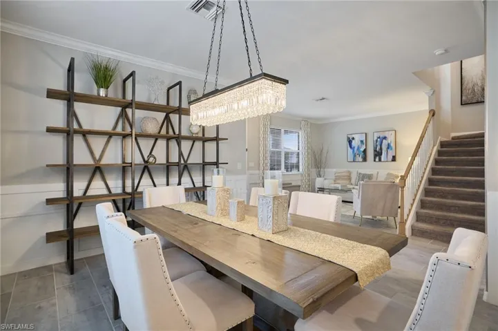Dining space with ornamental molding