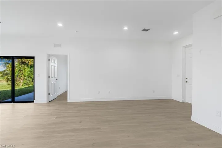 Spare room featuring light hardwood / wood-style floors