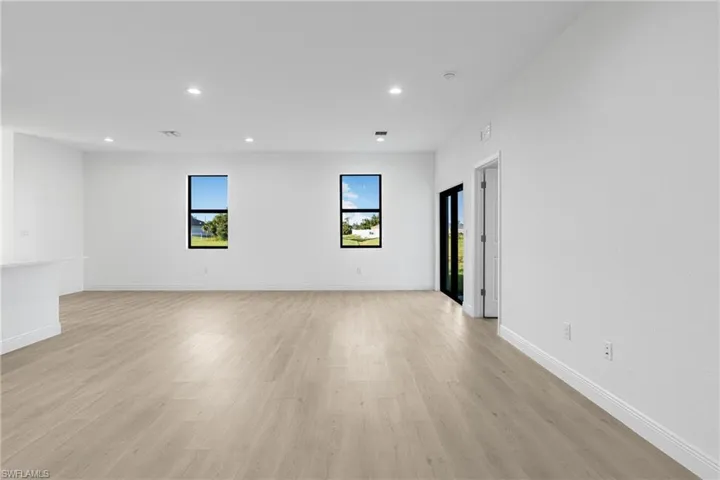 Empty room featuring light wood-type flooring