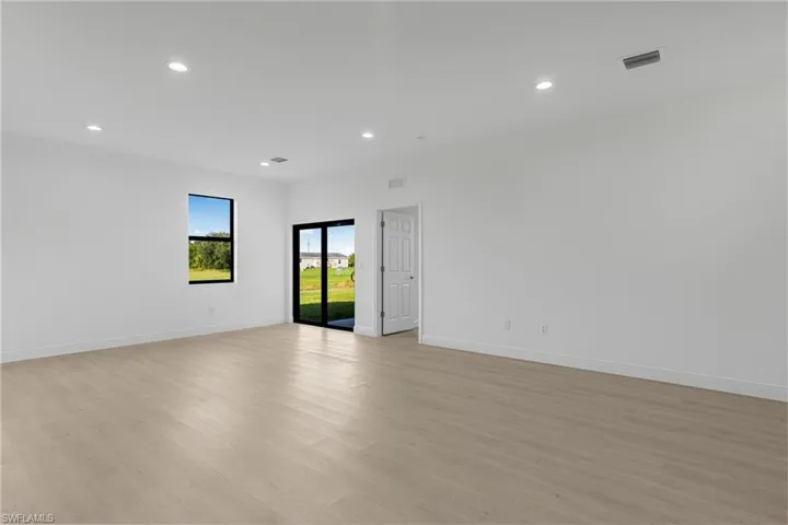 Unfurnished room featuring light hardwood / wood-style floors