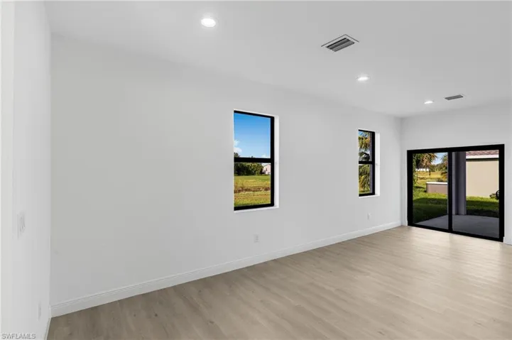 Spare room featuring light hardwood / wood-style floors