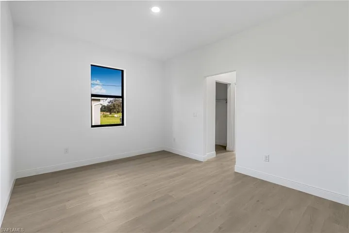 Spare room featuring light hardwood / wood-style floors