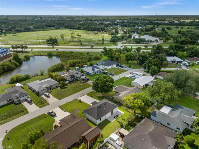 Aerial perspective showcasing a neighborhood with varied residential architecture