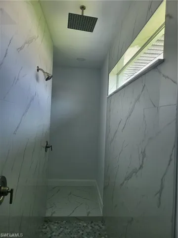 Bathroom featuring a shower