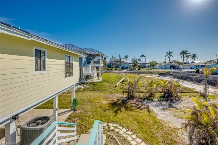 View of yard with central air condition unit