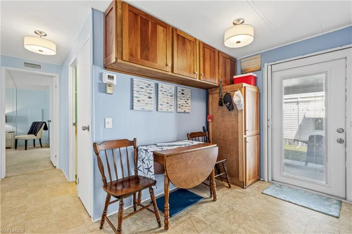 Dining space featuring light floors
