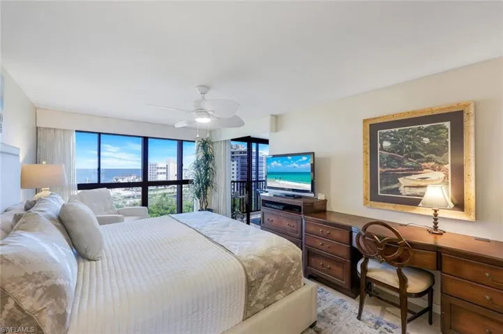 Bedroom featuring a desk and ceiling fan