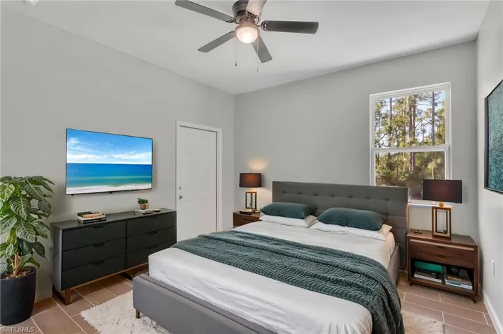 Bedroom featuring a ceiling fan