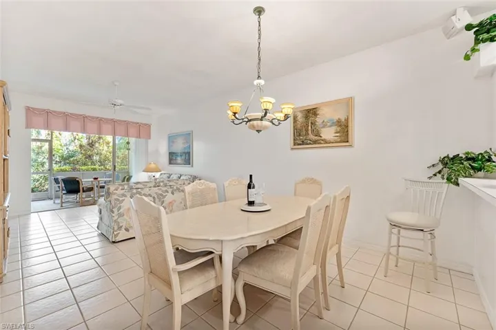 Dining table allows yet another space to eat, along with bar height seating.