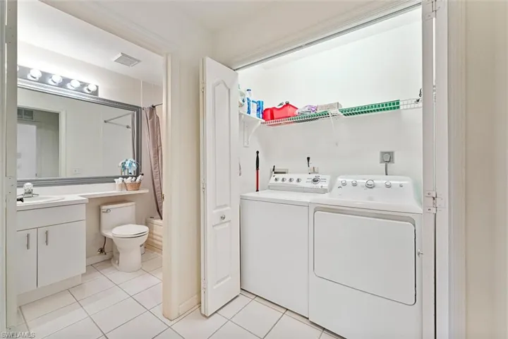 Washer & dryer plus plenty of storage.