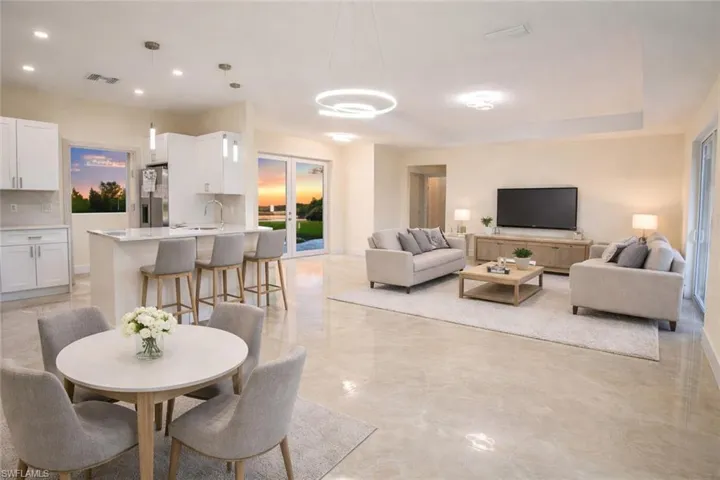Dining space featuring baseboards and recessed lighting