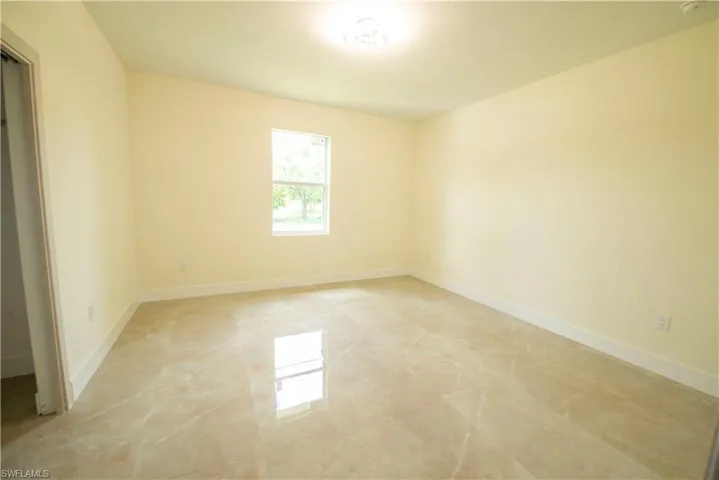 Empty room with baseboards