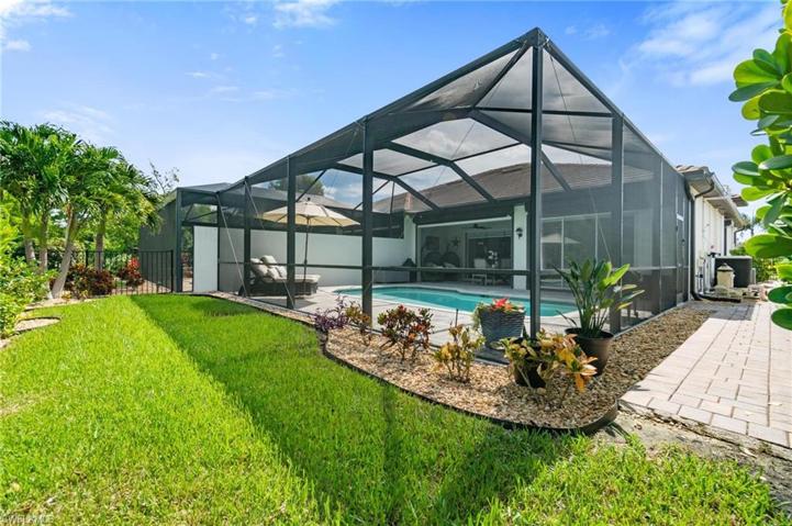 Fully fenced in, lush green backyard