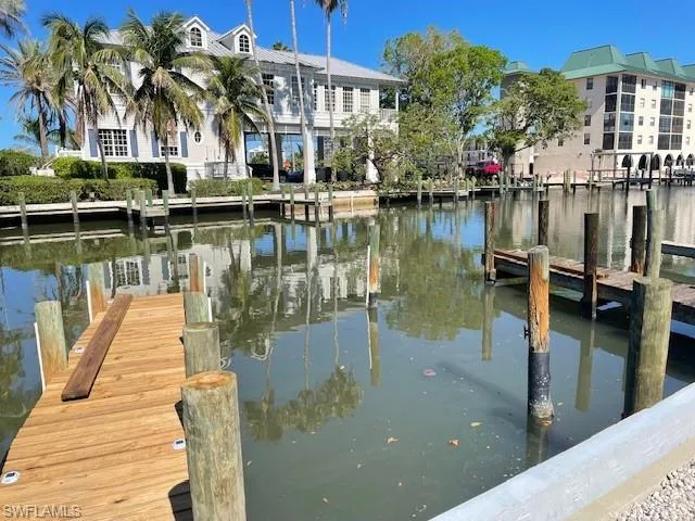 Dock featuring a water view