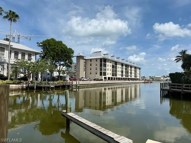Dock featuring a water view
