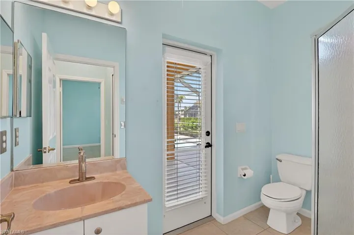 Bathroom featuring vanity and tile patterned flooring