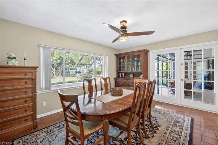 French doors provide easy access to the outdoor area, seamlessly extending your entertaining space outdoors.