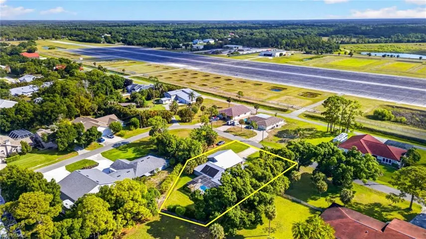 Aerial view illustrating approach end of 14.