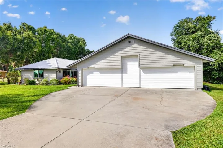 This home has a 2018 metal roof, impact windows, newer HVAC, new hot water heater, and is not located in a flood zone!