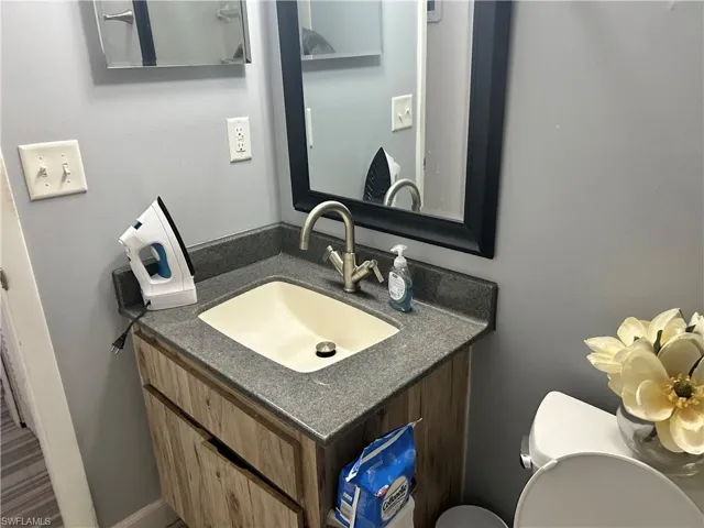 Bathroom with toilet and vanity