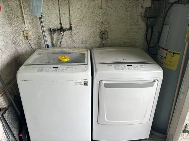Clothes washing area with electric water heater and washer and clothes dryer