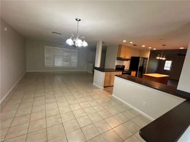 Living room and area that could be used as dining room